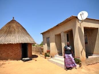 Woman outside house