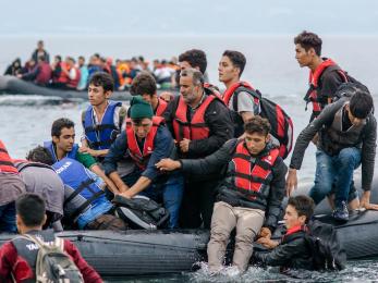 Refugees on inflatable boats