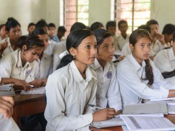 Sarmila sarki, 18, may become the first dalit girl from her village to ever finish the 10th grade. here she is pictured sitting in class.