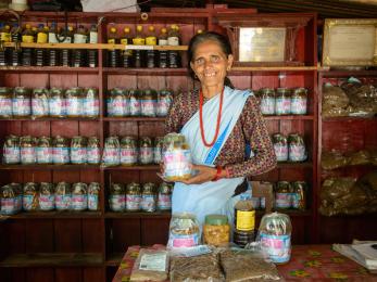 Women aren't often involved in business in rural nepal, but 59-year-old harikala is the strong leader of her family's bustling pickle shop.