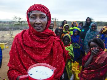 Dima is the sole provider for her eight children, and her livelihood, like that of her community near yabello, ethiopia, depends on cattle. dima has learned to run a successful small business buying and selling milk. photo: sean sheridan for mercy corps