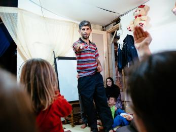 Ziad with his family teaching