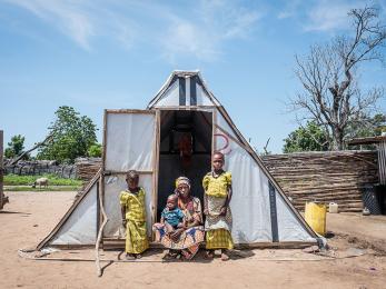 Starving children often become the face of a hunger crisis — but many things have to go wrong to get to that point. hauwa, pictured here with her kids in nigeria, fled boko haram before settling in an overcrowded village with no markets. they often go days without eating. photo: tom saater for mercy corps.