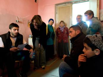 A former school building now being housed with idp's from the gori area who were dislocated by the bombing. mercy corps staff meet with them to assess their winterization needs. photo: jeffrey austin for mercy corps