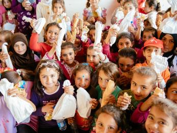 Students at habbouch public school in lebanon get ready for lunchtime. they received healthy bag lunches through our lunch delivery program, which helped fight hunger in lebanese schools that serve refugee and low-income children. photo: corinna robbins/mercy corps