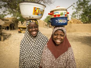 Friends mariya and badariya in niger after participating in one of mercy corps' discussion groups for girls. photo: sean sheridan for mercy corps