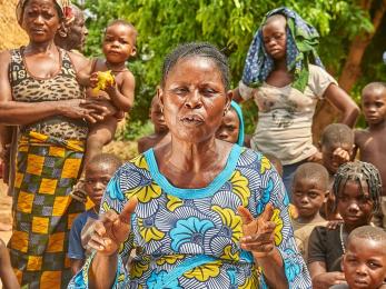 Woman speaking to community