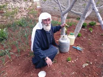 This farmer made pickled lettuce from his garden. mercy corps trains syrian farmers to save the seeds from their vegetables to use again next season.
