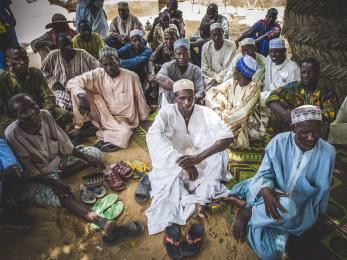 A group of people sitting together.