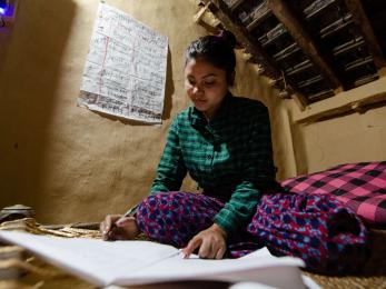 A young person studying.