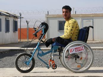 A person in a customized wheelchair.