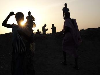 Silhouettes of various people.