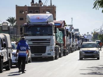 Aid trucks crossing Hafah into Gaza. Photo by Ahmad Salem/Bloomberg via Getty Images