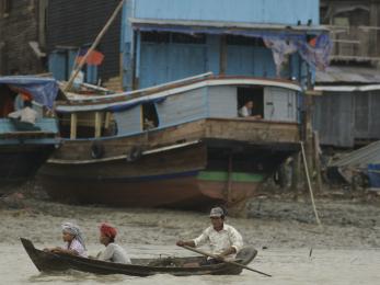 People navigate floodwaters after cyclone nargis in 2008. recent flooding in myanmar has affected at least 250,000 people. photo: jacqueline m. koch for mercy corps