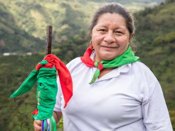 A member of the indigenous yanakona community, and a participant in mercy corps’ rural women of cauca program on their coffee farm.