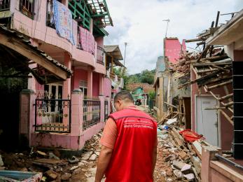 A mercy corps indonesia response team member conducting needs assessments in the cianjur district following the earthquake that struct west java.