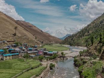 Agricultural river scene in a valley in nepal.