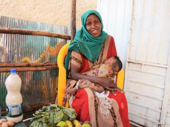 Ethiopian woman holding baby